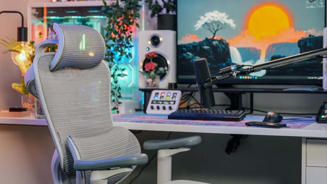 Sleek gaming setup with RGB lights and ergonomic chair offers modern home office styling ideas.