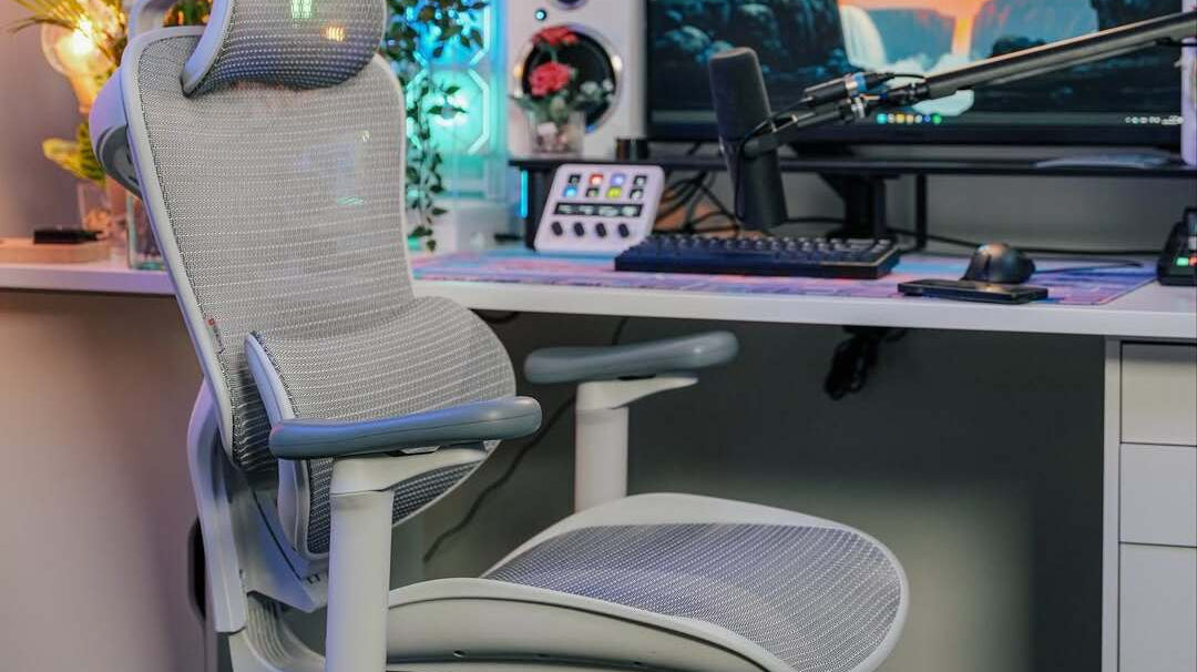Ergonomic mesh office chair in a modern workspace showing how to make your office chair more comfortable
