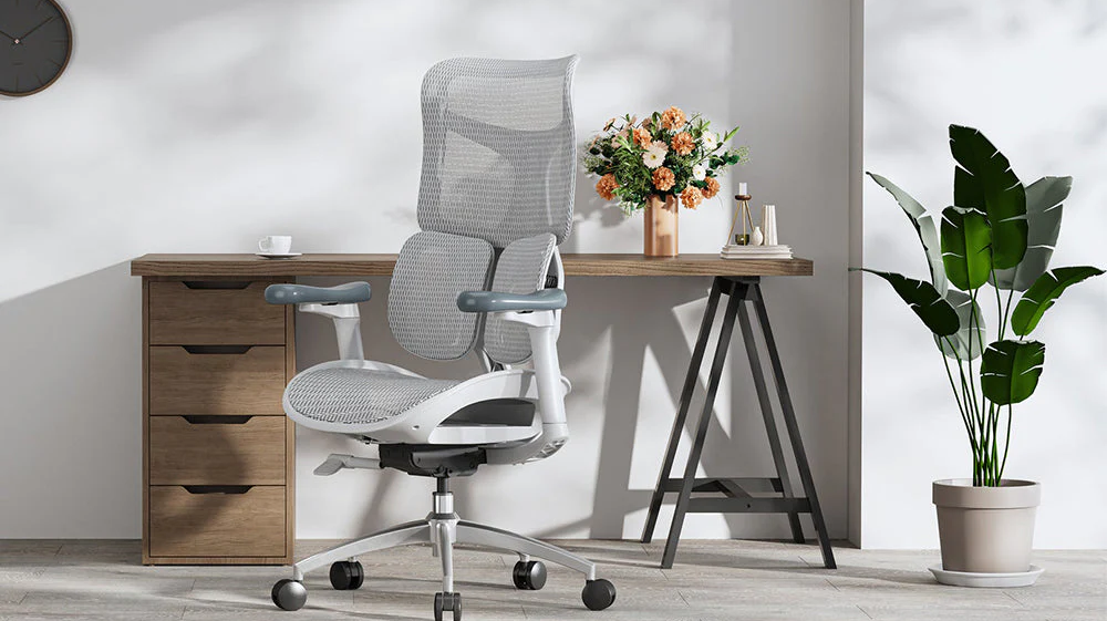 Ergonomic office chair in a bright home office promoting work focus and wellbeing.