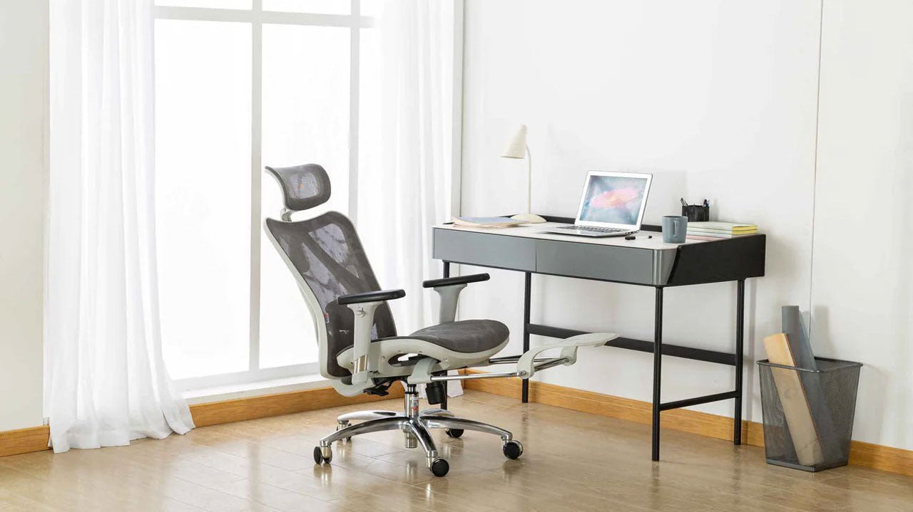 An ergonomic chair placed in a modern office setting, illustrating The Science Behind Ergonomic Office Chairs and how design supports posture, comfort, and productivity.