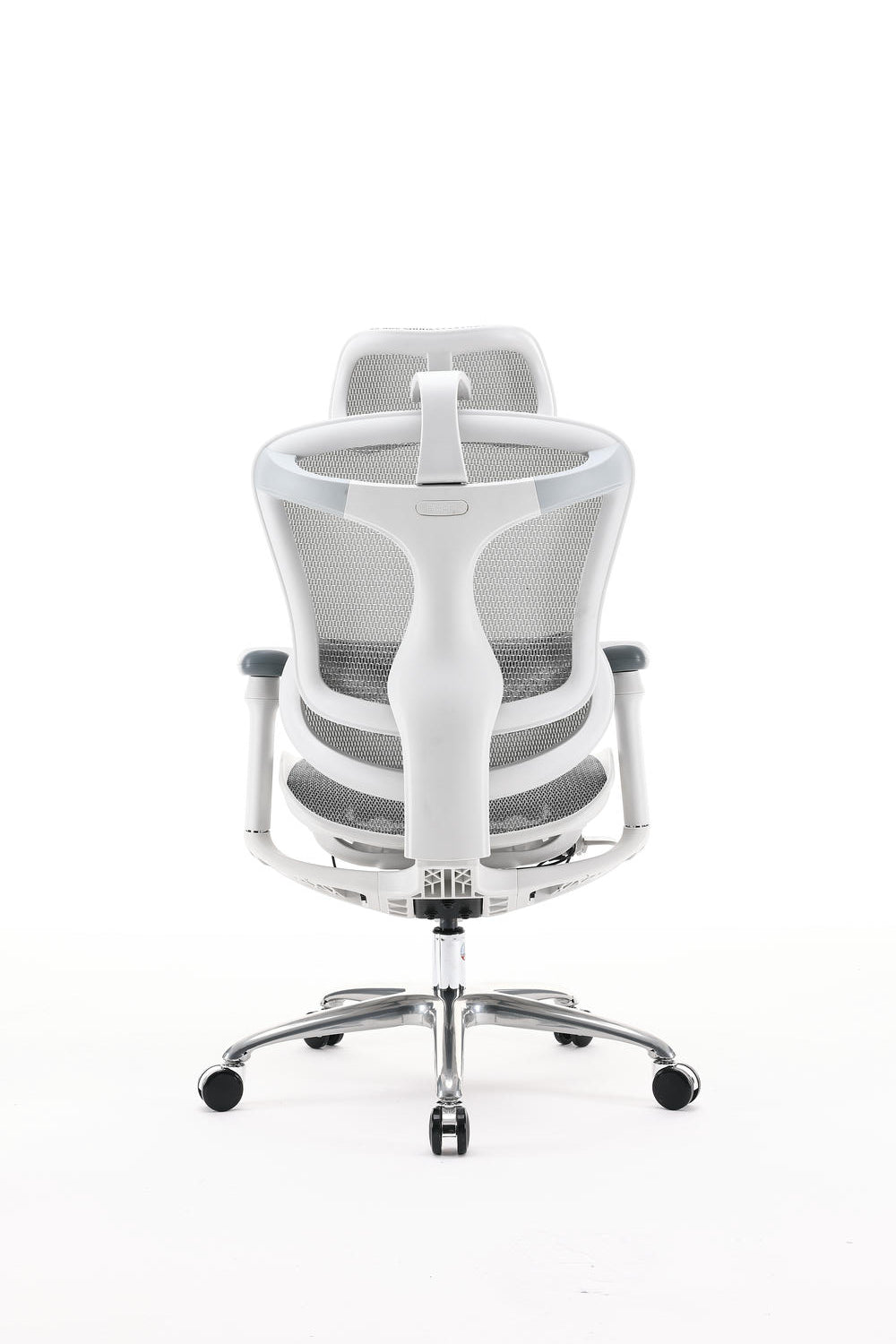 Rear view of white sihoo doro c100 ergonomic chair in australia on a minimal white background
