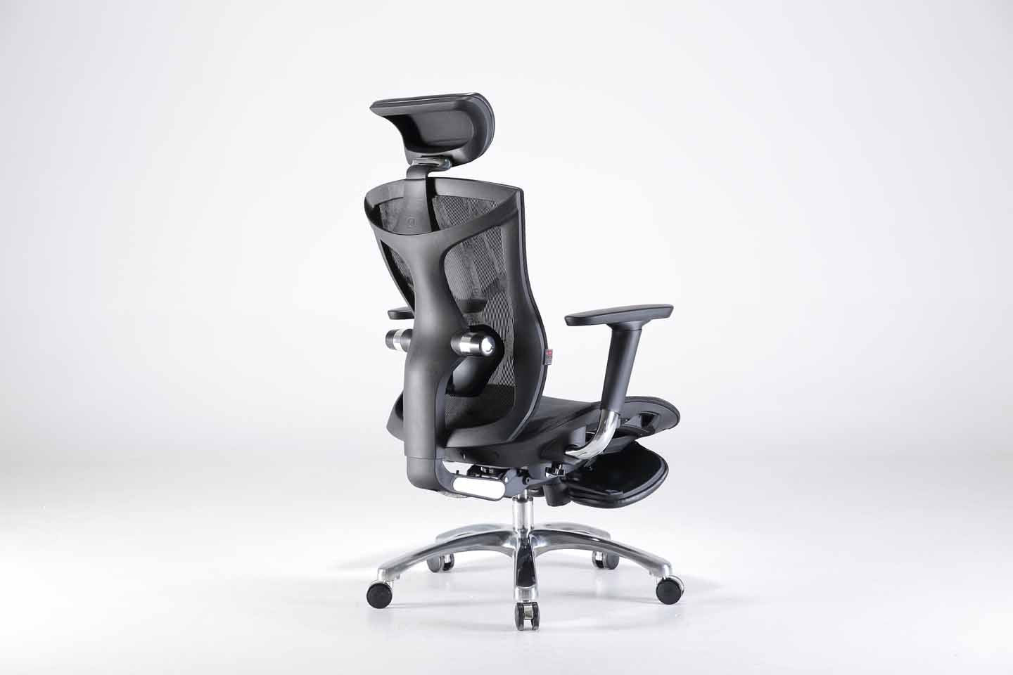 Semi back right view of black Sihoo V1 ergonomic chair in Australia with footrest on a gray background, highlighting adjustable lumbar support and ergonomic design
