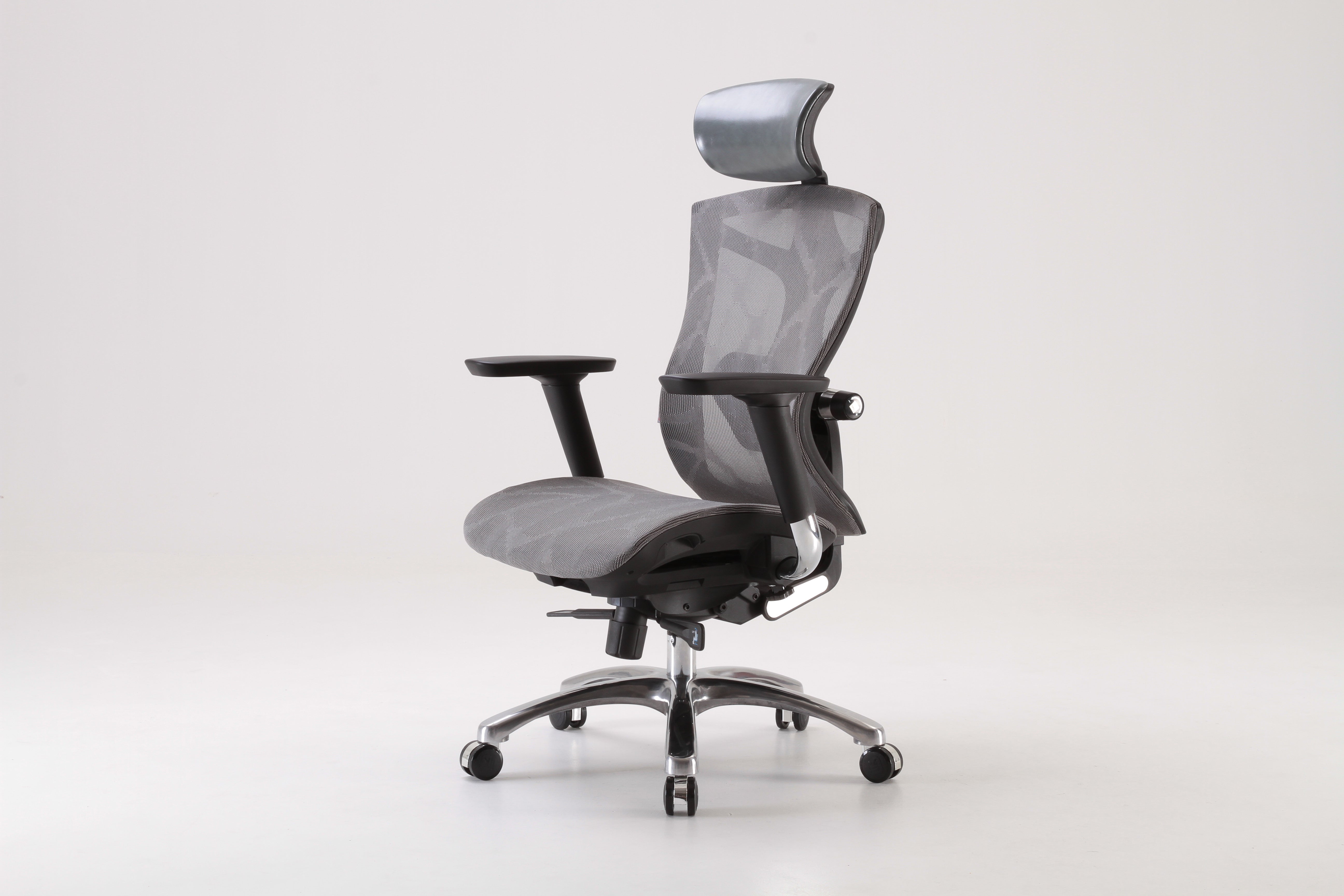Semi front left view of ergonomic chair in Australia on a gray background, highlighting adjustable features and modern design