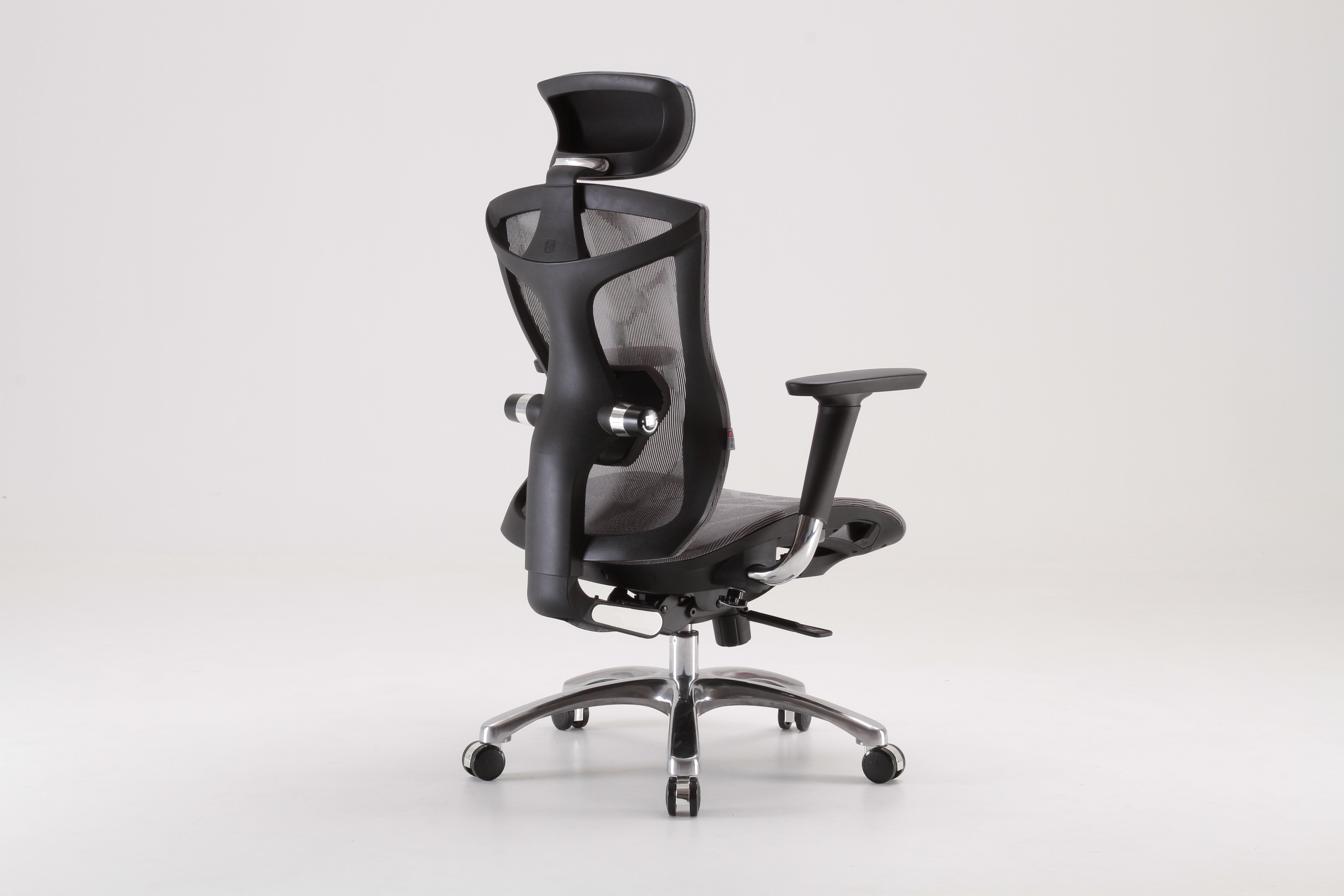 Semi back right angle of black Sihoo V1 ergonomic chair in Australia on gray background, emphasizing ergonomic comfort and posture support