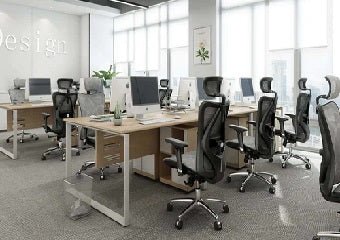 Modern ergonomic office chairs in a bright office space, showcasing the benefits of renewing office furniture for comfort and productivity