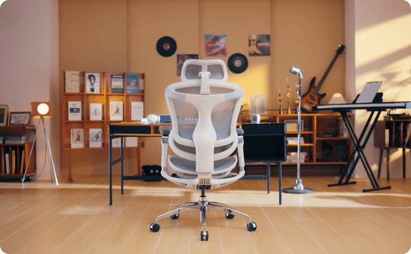 Sihoo ergonomic office chair placed in a creative home office and music studio setup, illustrating how ergonomics can be applied in the workplace.