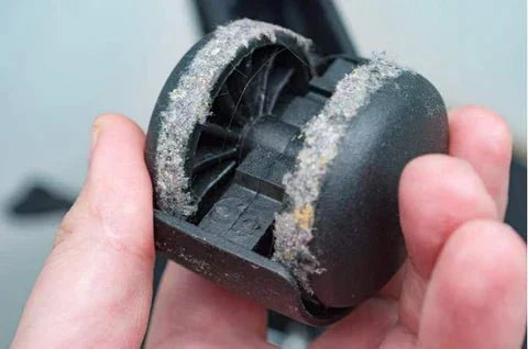 Close-up of office chair caster wheels showing how to remove caster wheels from an office chair