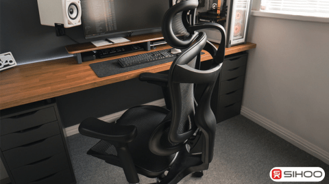 Ergonomic chair styled in a clean space reflecting the art of minimalist living.