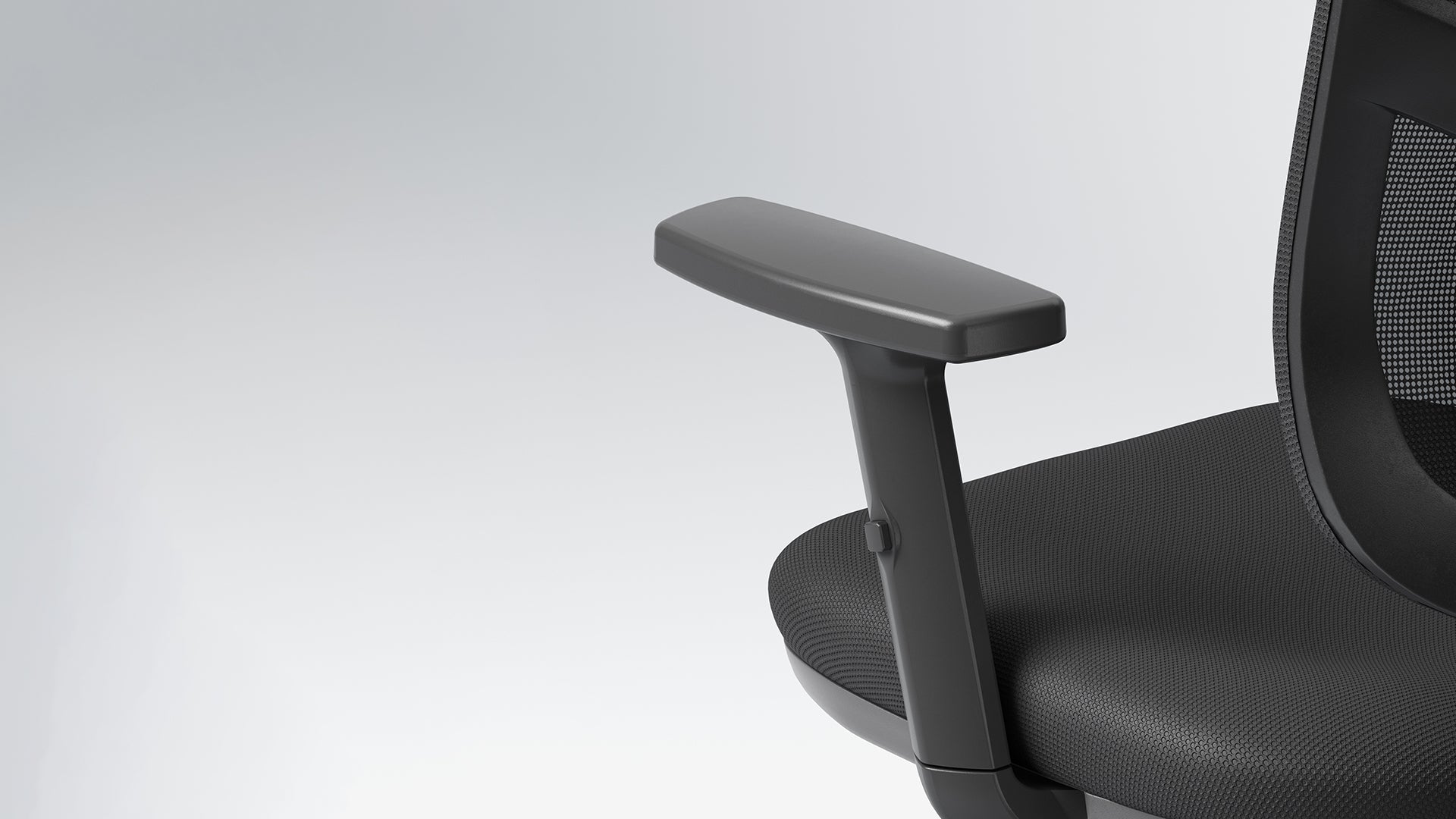 Close-up view of an ergonomic chair armrest on a white background highlighting design details of ergonomic chairs in Australia.
