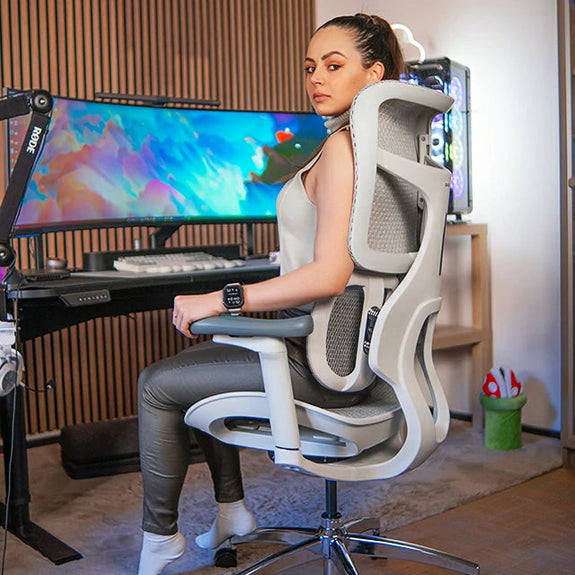 Woman sitting on ergonomic chair in Australia in a home office setup showing comfort and proper posture.