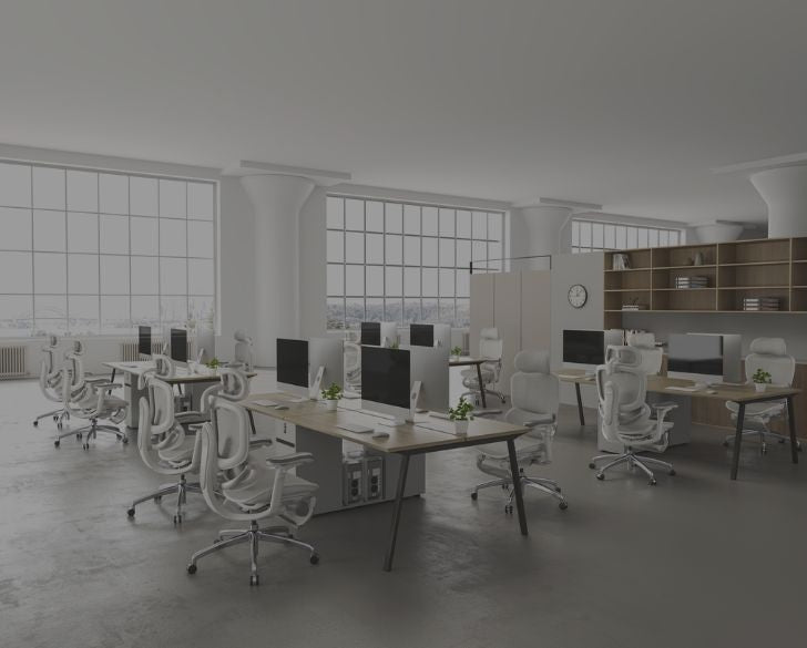 Modern office setup featuring all-white ergonomic chairs in a bright workspace.