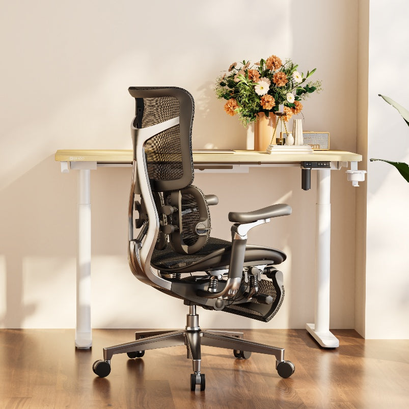 Black ergonomic chair with footrest in an Australian office setup, highlighting comfort, lumbar support, and modern workspace design