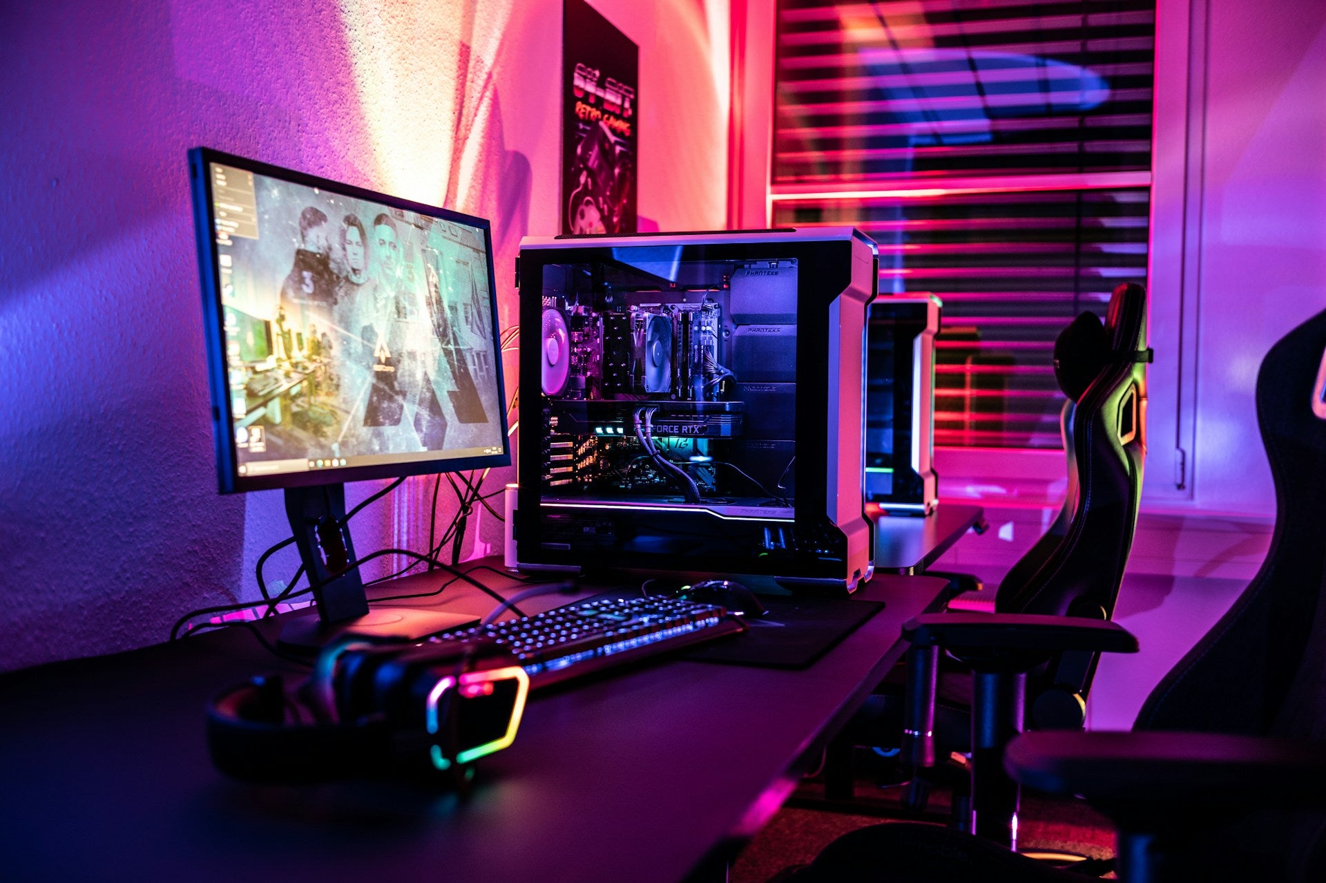 Gaming room in Australia with LED lights, gaming setup, and an ergonomic gaming chair.